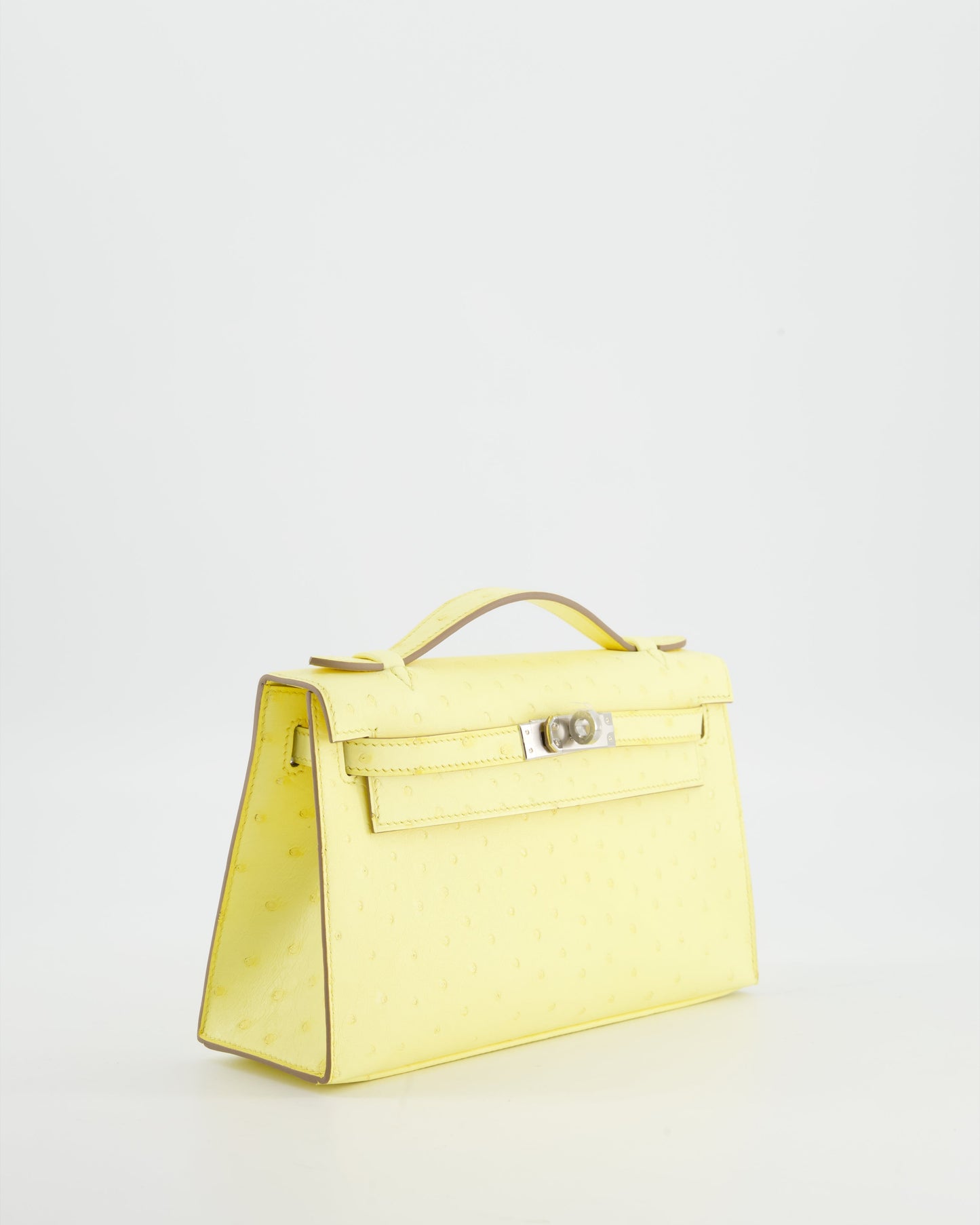 Herm�s Kelly Pochette Bag in Limoncello Ostrich Leather with Palladium Hardware