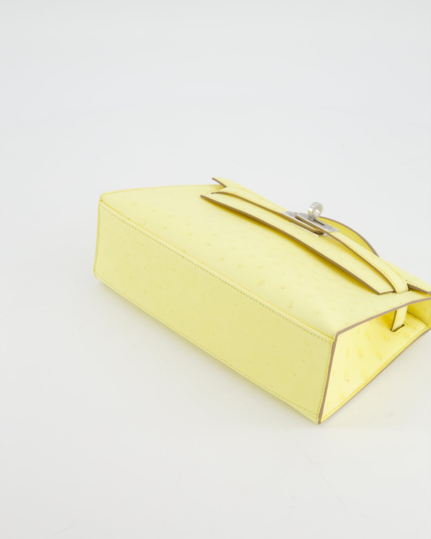 Herm�s Kelly Pochette Bag in Limoncello Ostrich Leather with Palladium Hardware