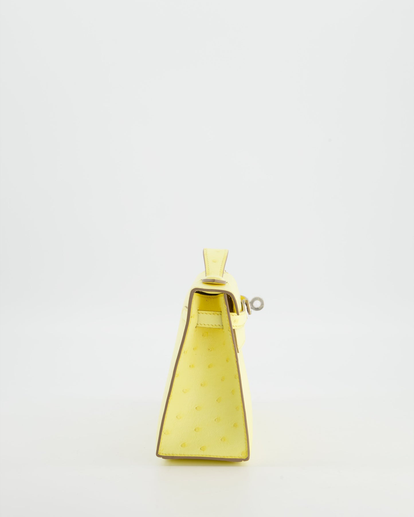 Herm�s Kelly Pochette Bag in Limoncello Ostrich Leather with Palladium Hardware