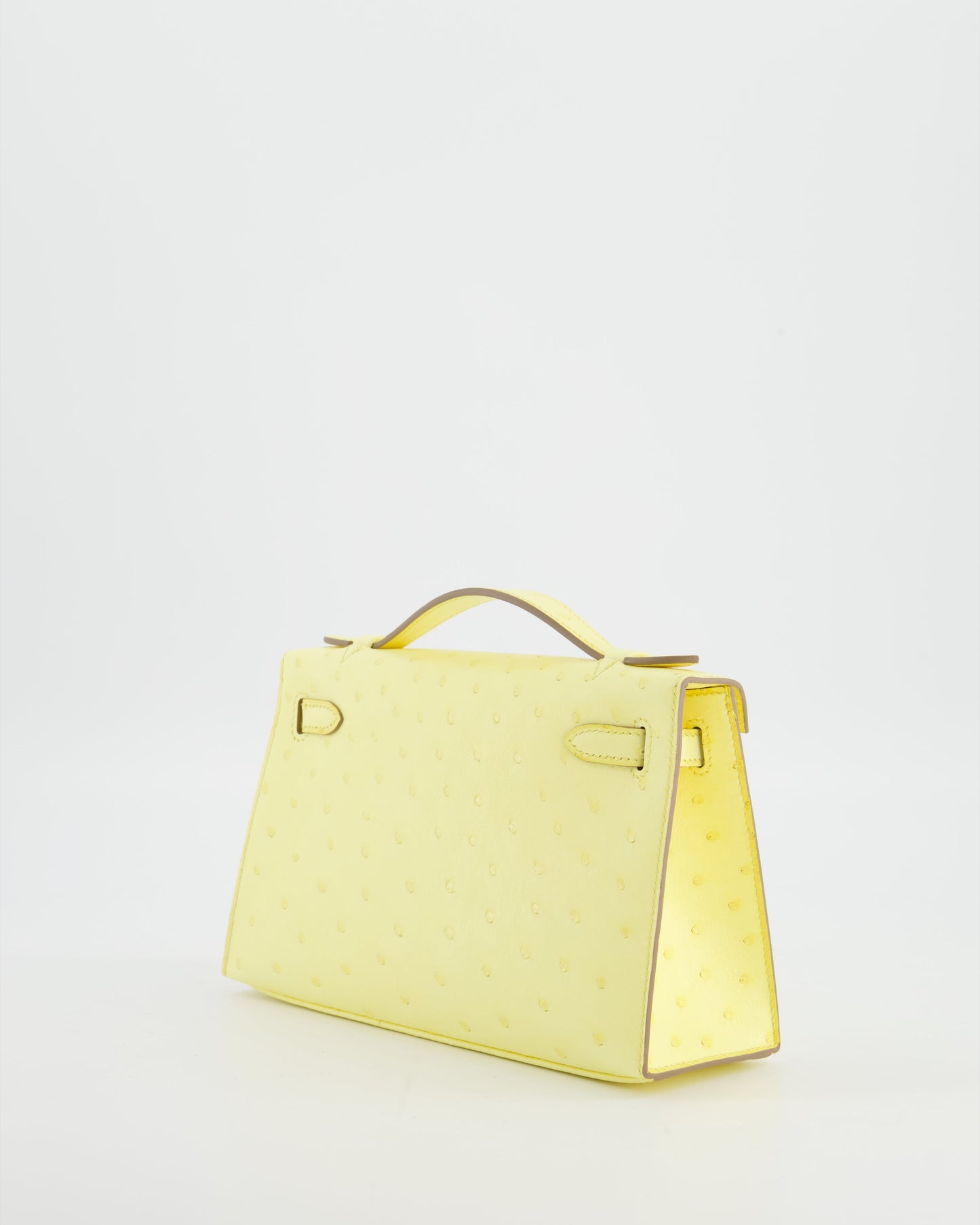 Herm�s Kelly Pochette Bag in Limoncello Ostrich Leather with Palladium Hardware