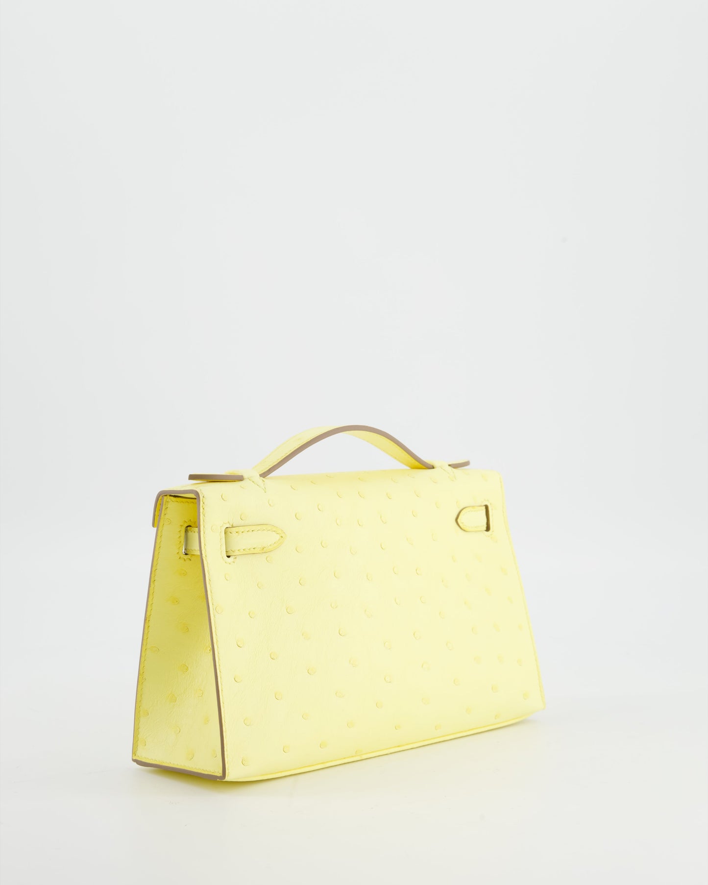 Herm�s Kelly Pochette Bag in Limoncello Ostrich Leather with Palladium Hardware