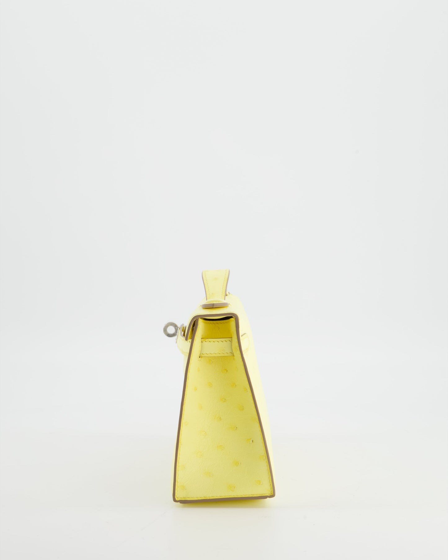 Herm�s Kelly Pochette Bag in Limoncello Ostrich Leather with Palladium Hardware