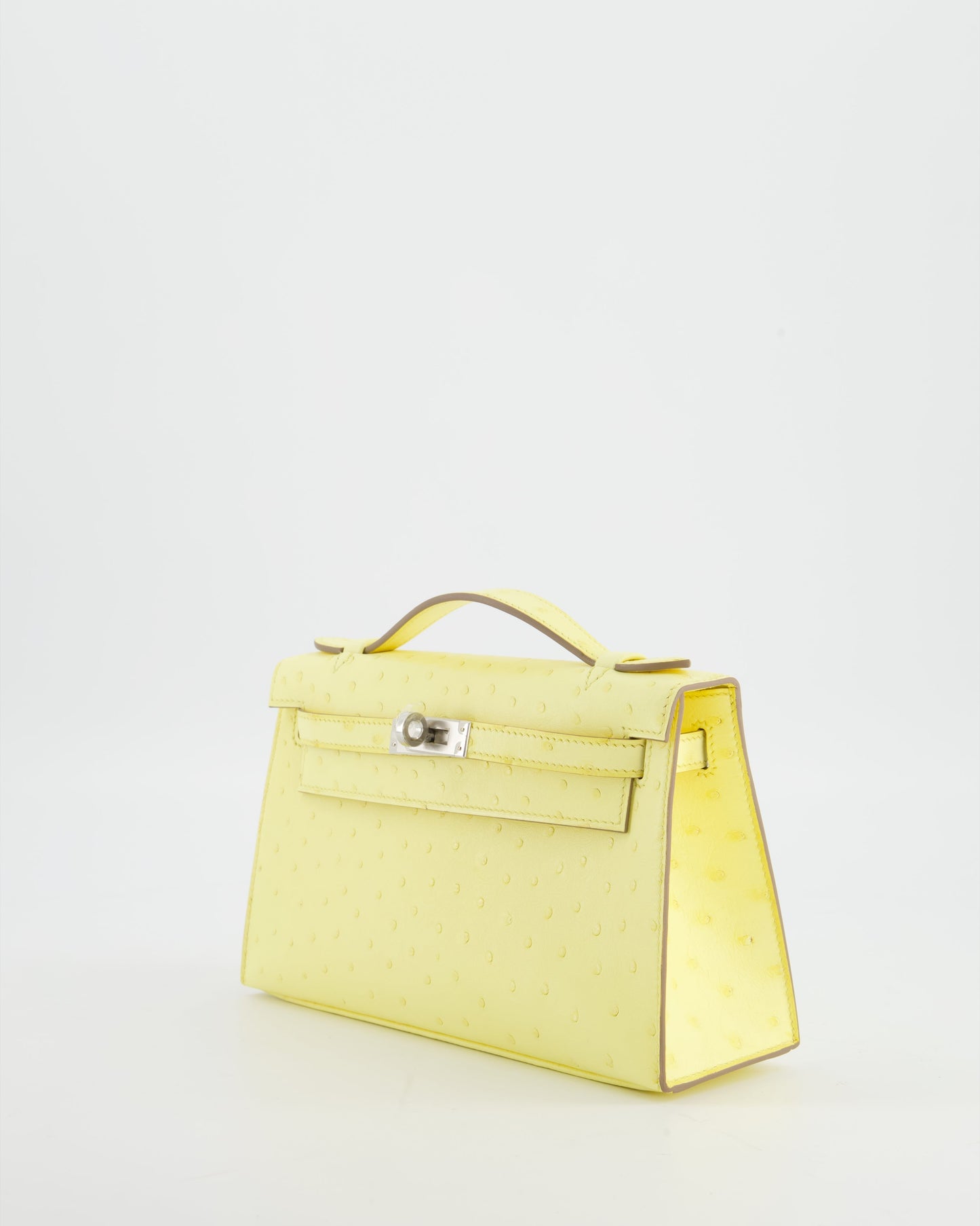Herm�s Kelly Pochette Bag in Limoncello Ostrich Leather with Palladium Hardware
