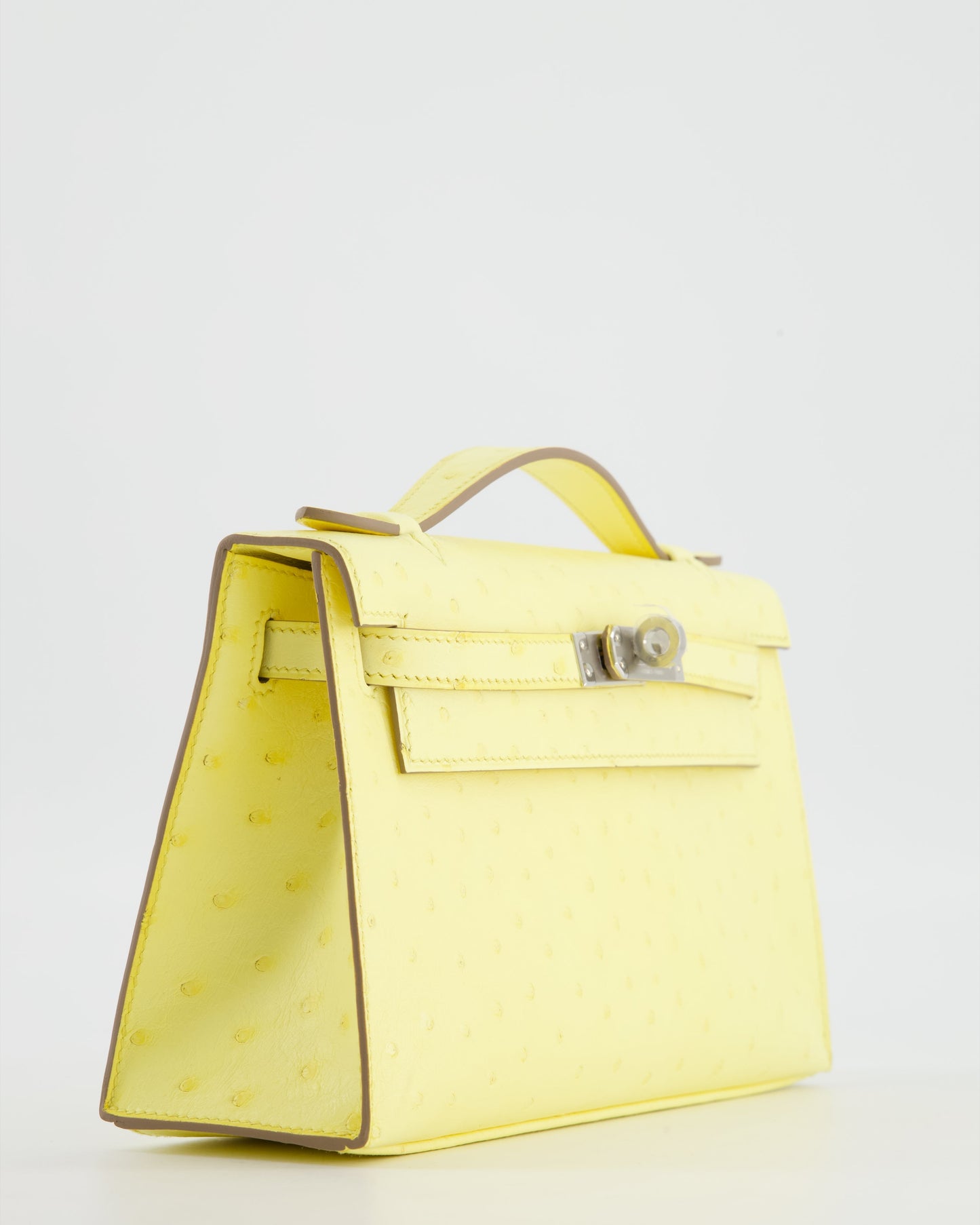 Herm�s Kelly Pochette Bag in Limoncello Ostrich Leather with Palladium Hardware
