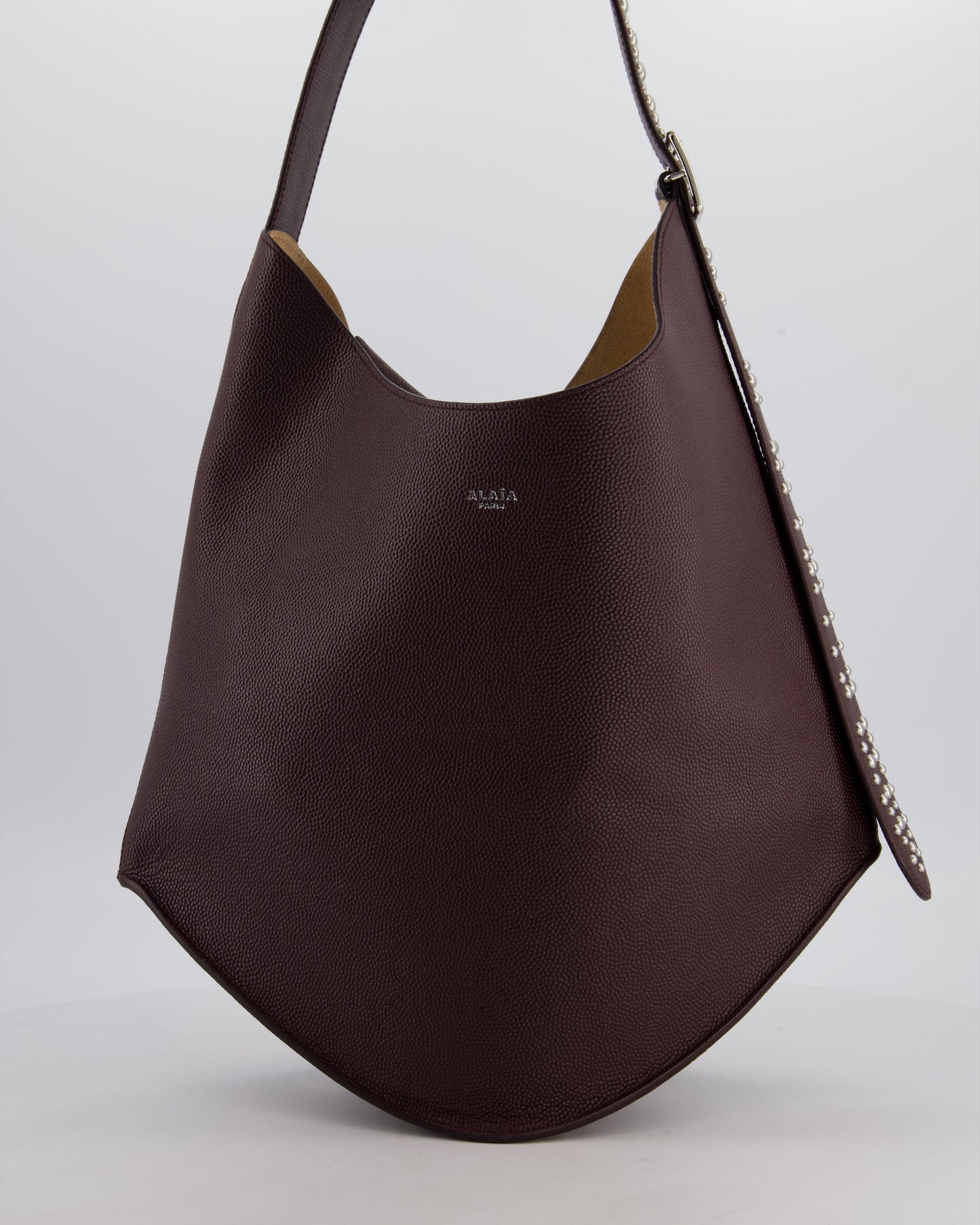 Alaïa Le Gail Large Leather Tote Bag with Adjustable Shoulder Strap with Adorned Studs and Silver Studded Base