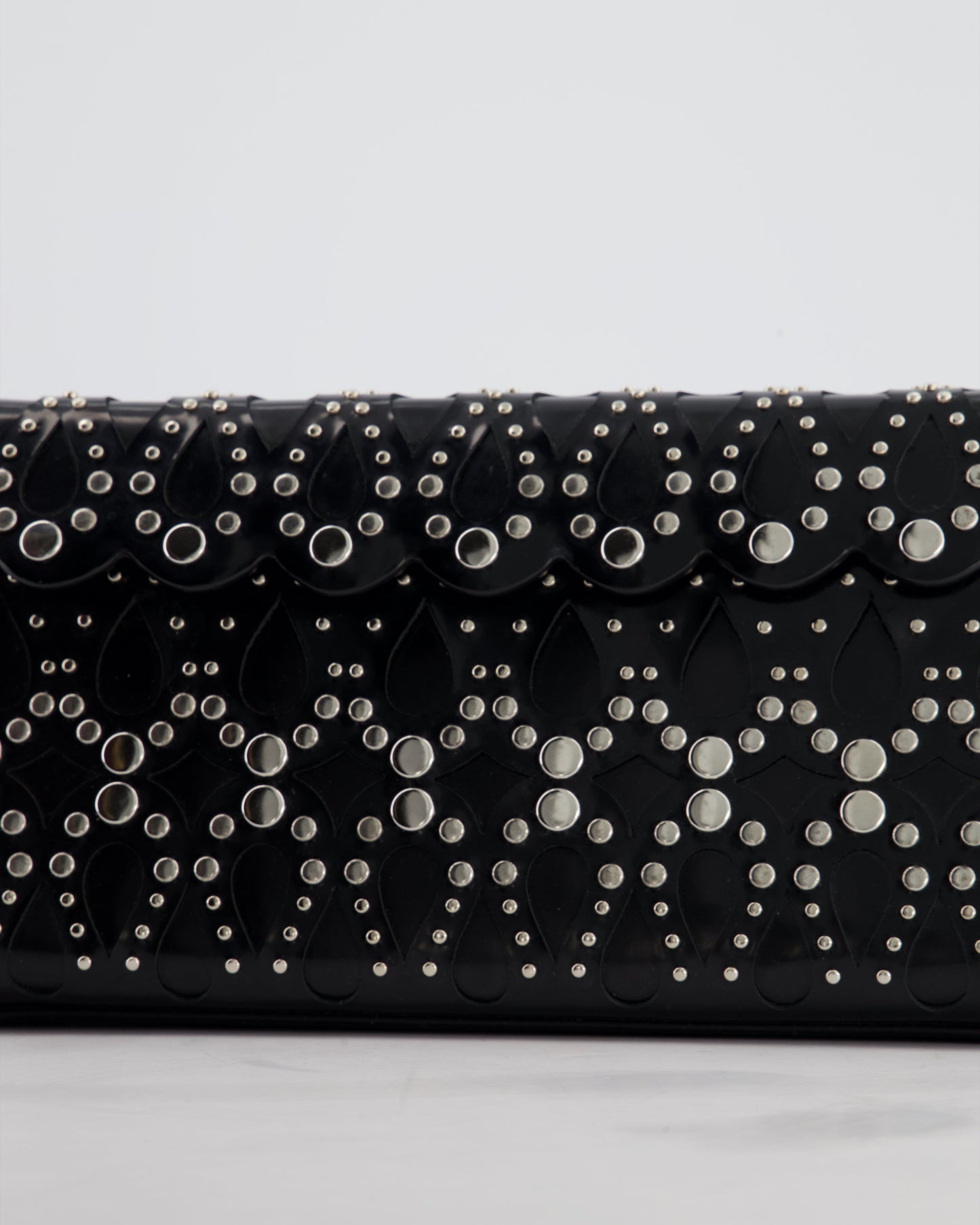 Alaïa Studded Laser Cut Flap Clutch Bag in Black Patent Leather with Wrist Strap and Mirror