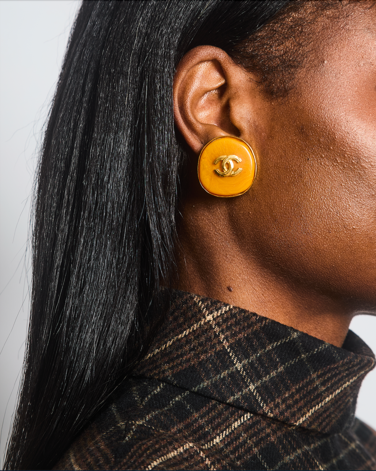 Chanel   98P Orange Rounded Clip On Earrings with Gold Rim and CC Logo Detail