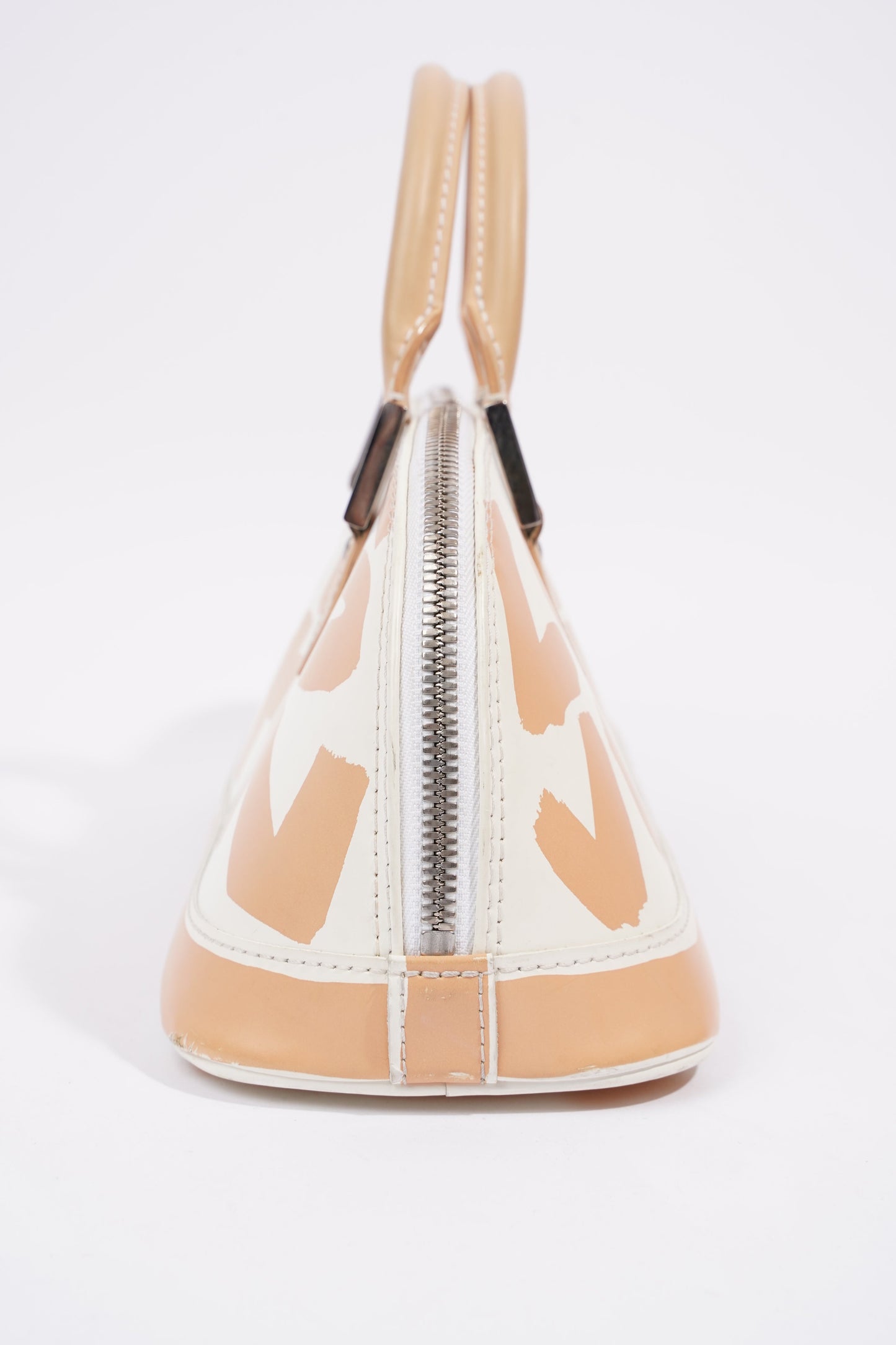 Louis Vuitton Alma Long Stephen Spro  White / Nude Coated Canvas