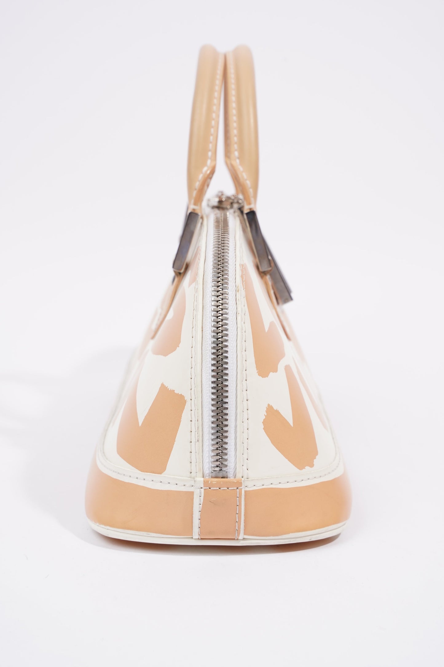 Louis Vuitton Alma Long Stephen Spro  White / Nude Coated Canvas