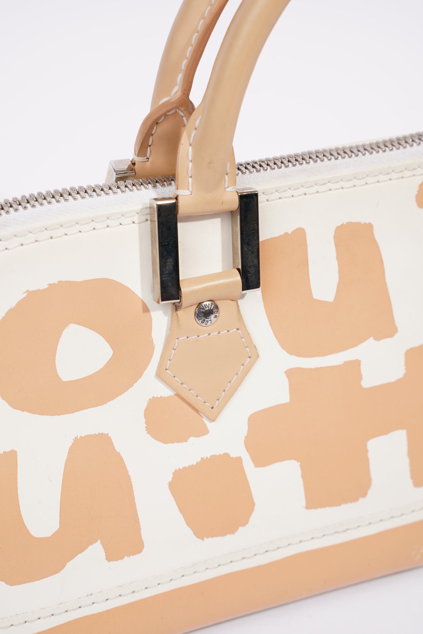 Louis Vuitton Alma Long Stephen Spro  White / Nude Coated Canvas