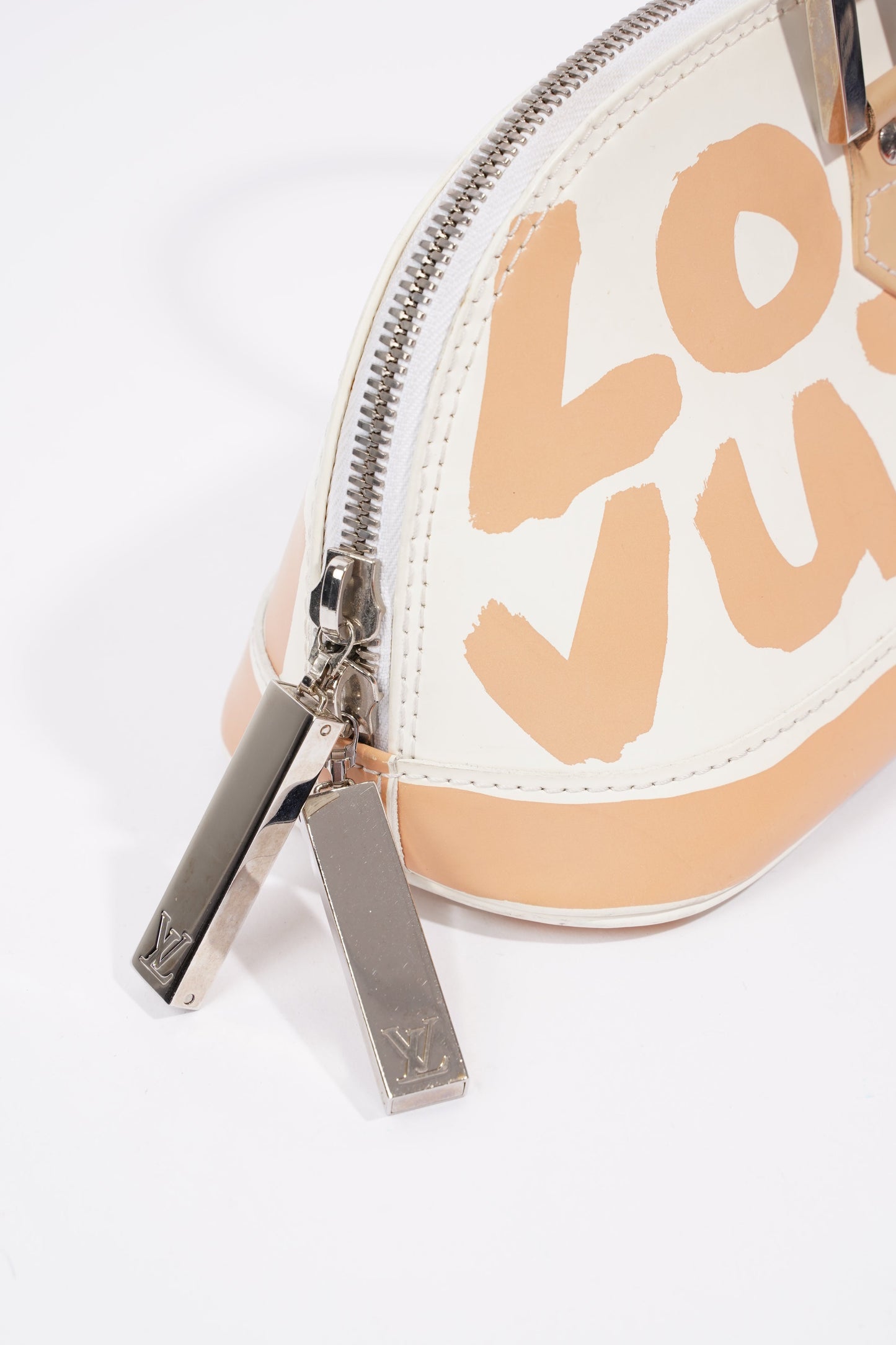Louis Vuitton Alma Long Stephen Spro  White / Nude Coated Canvas