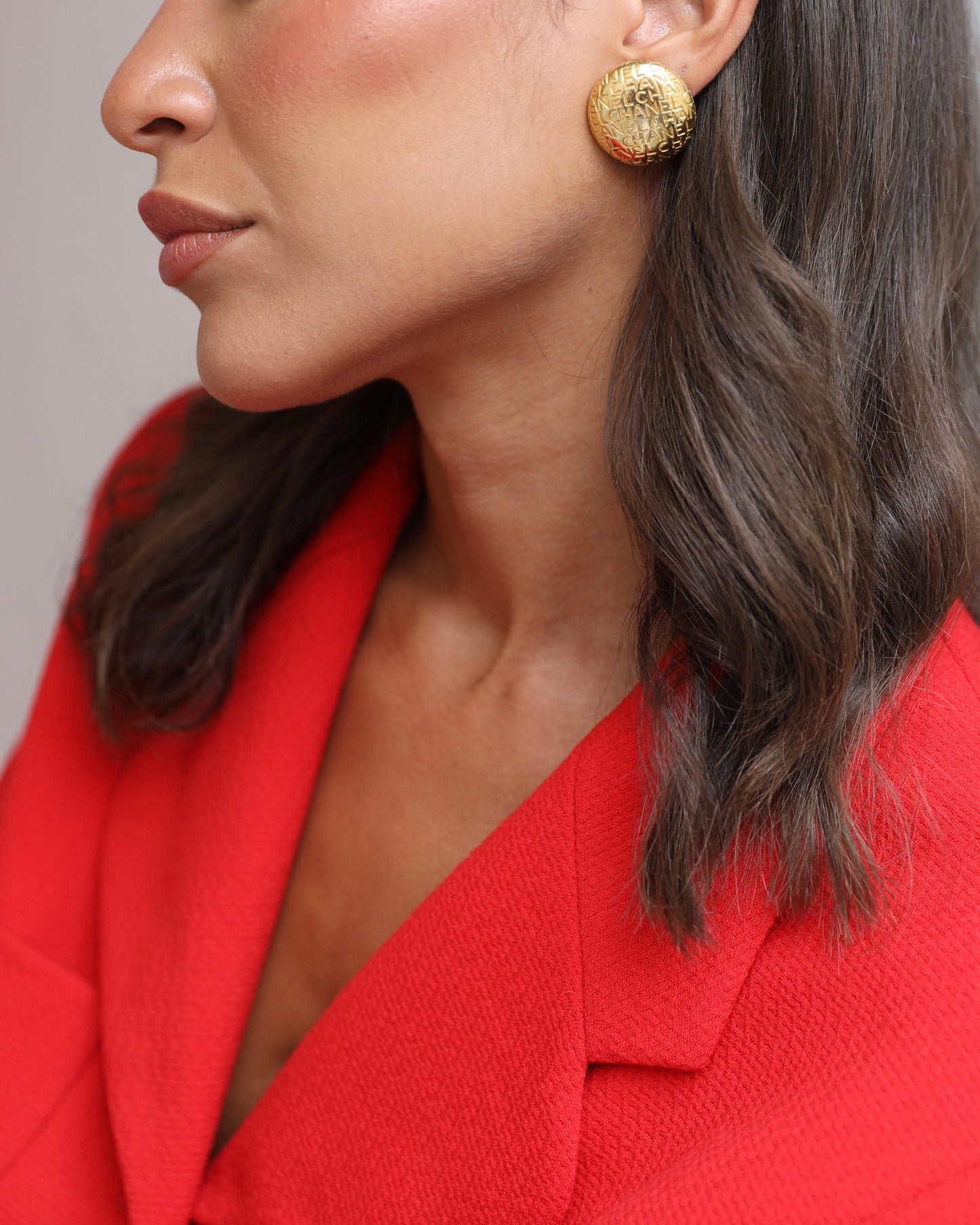 Chanel   Gold Round Clip-On Earrings with Embossed Chanel Details