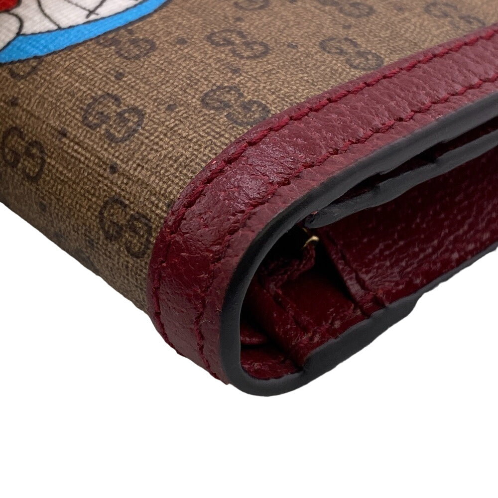 GUCCI Bifold Wallet 647788 Leather, PVC Brown Compact wallet Mini GG Supreme Doraemon Women