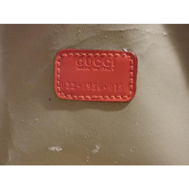 Gucci   Reddish Orange Glossy Leather Satchel