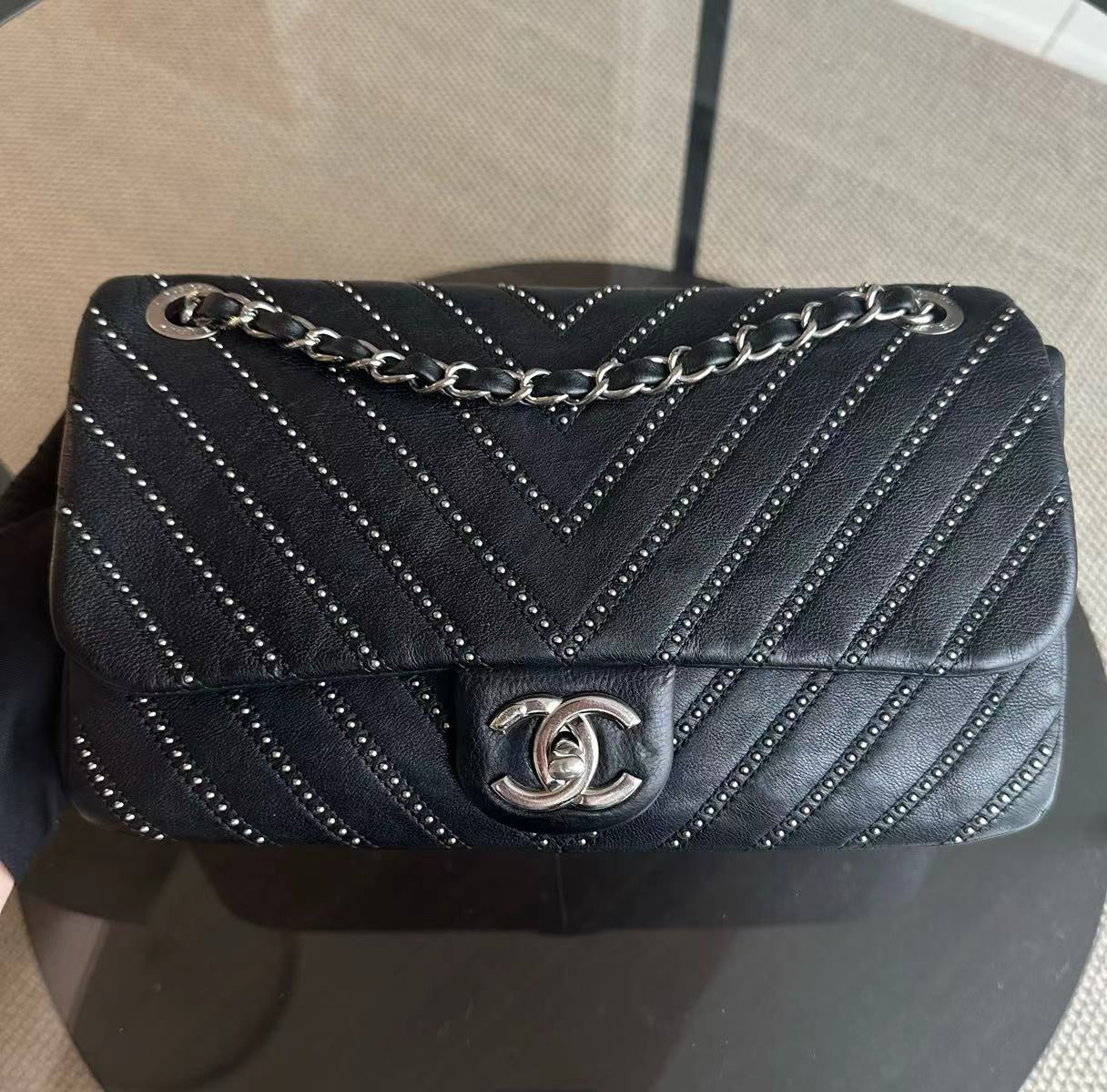 Chanel Seasonal Flap - Studded 25CM Chevron Calfskin Black Silver Hardware Series 24