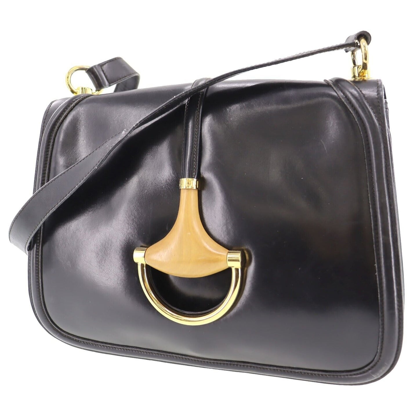 , navy leather, Gucci shoulder bag with XL gold & tan leather horsebit accent with cut-out & 'GUCCI' engraved on top