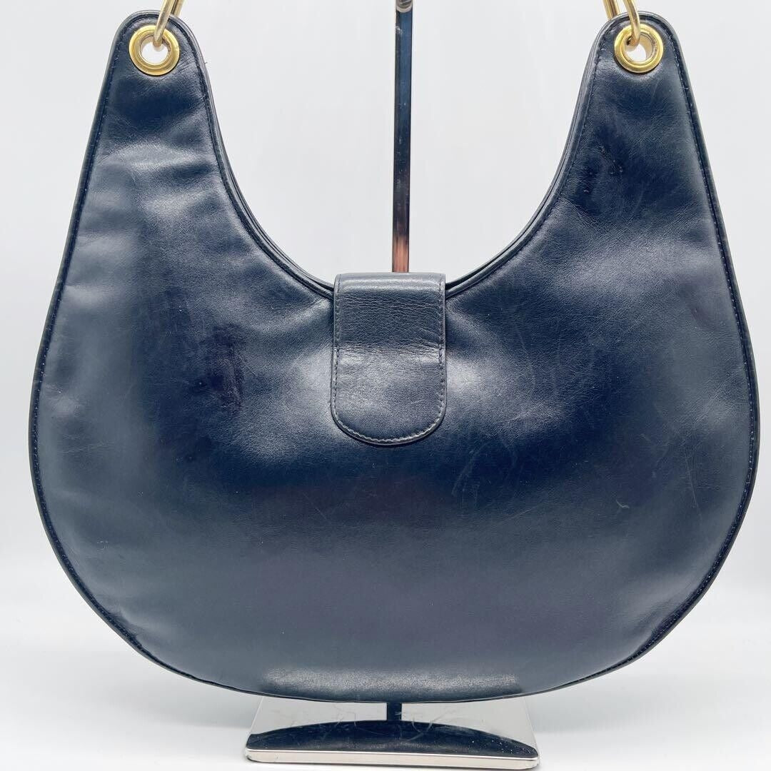 , rare, midnight blue leather, Gucci shoulder bag with a large, two-tone 'GG' emblem and removable strap