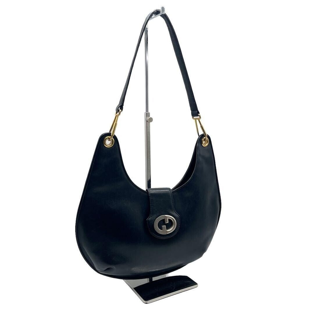 , rare, midnight blue leather, Gucci shoulder bag with a large, two-tone 'GG' emblem and removable strap