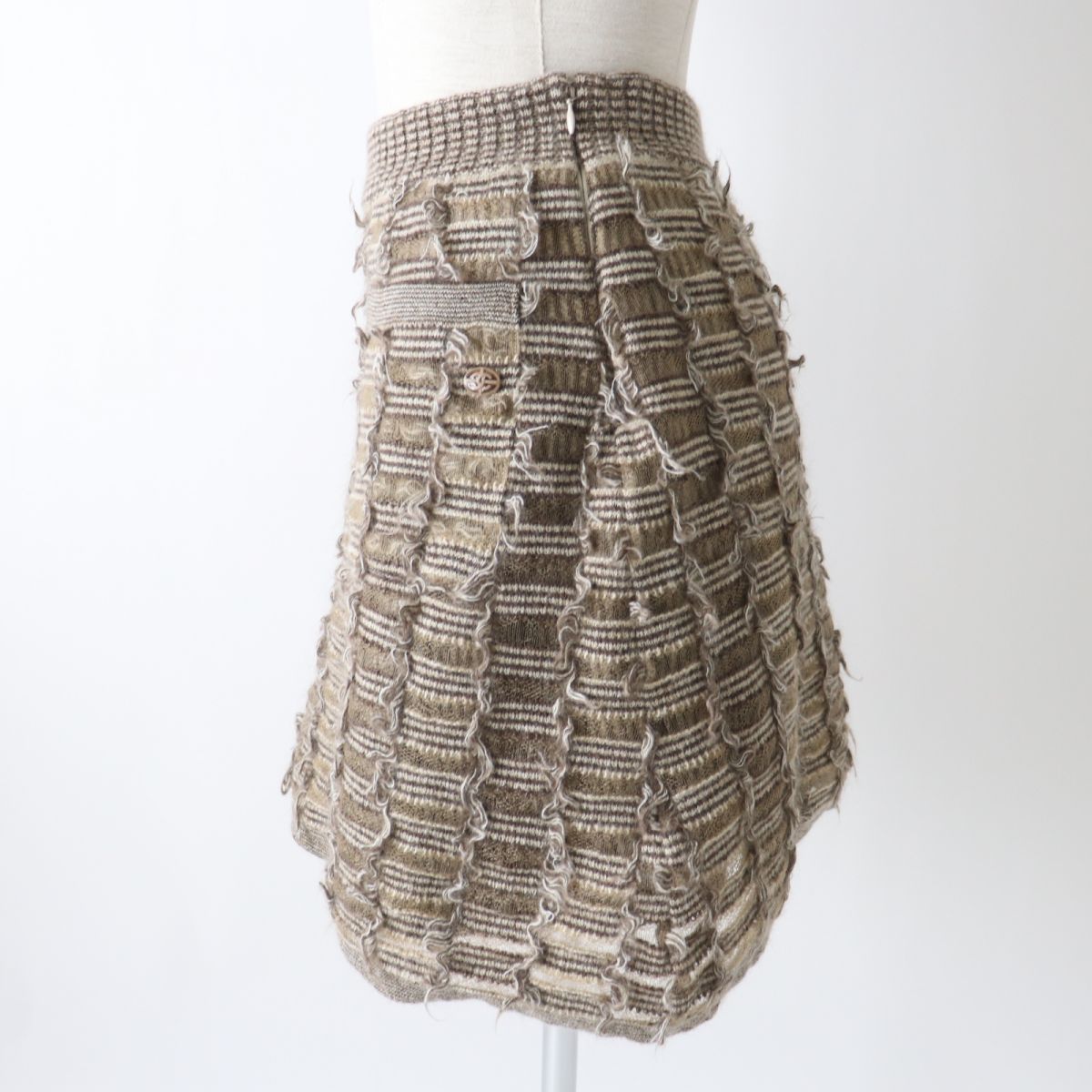 CHANEL skirt Outer: 54% mohair, Outer: 41% nylon, Outer: 5% wool, Lining: 91% silk, Lining: 9% elastane Brown type Women 34