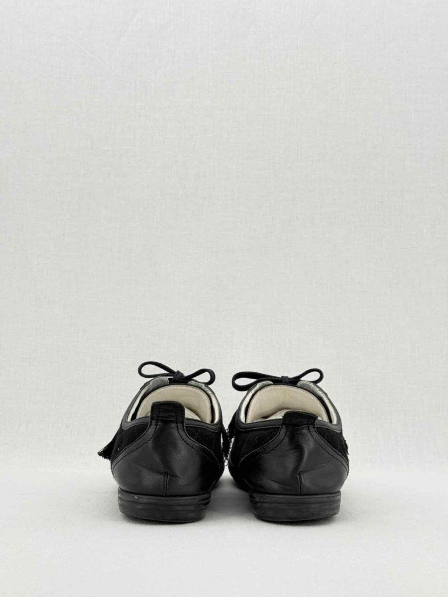 CHANEL Black Quilted Size EU 40 Sneakers