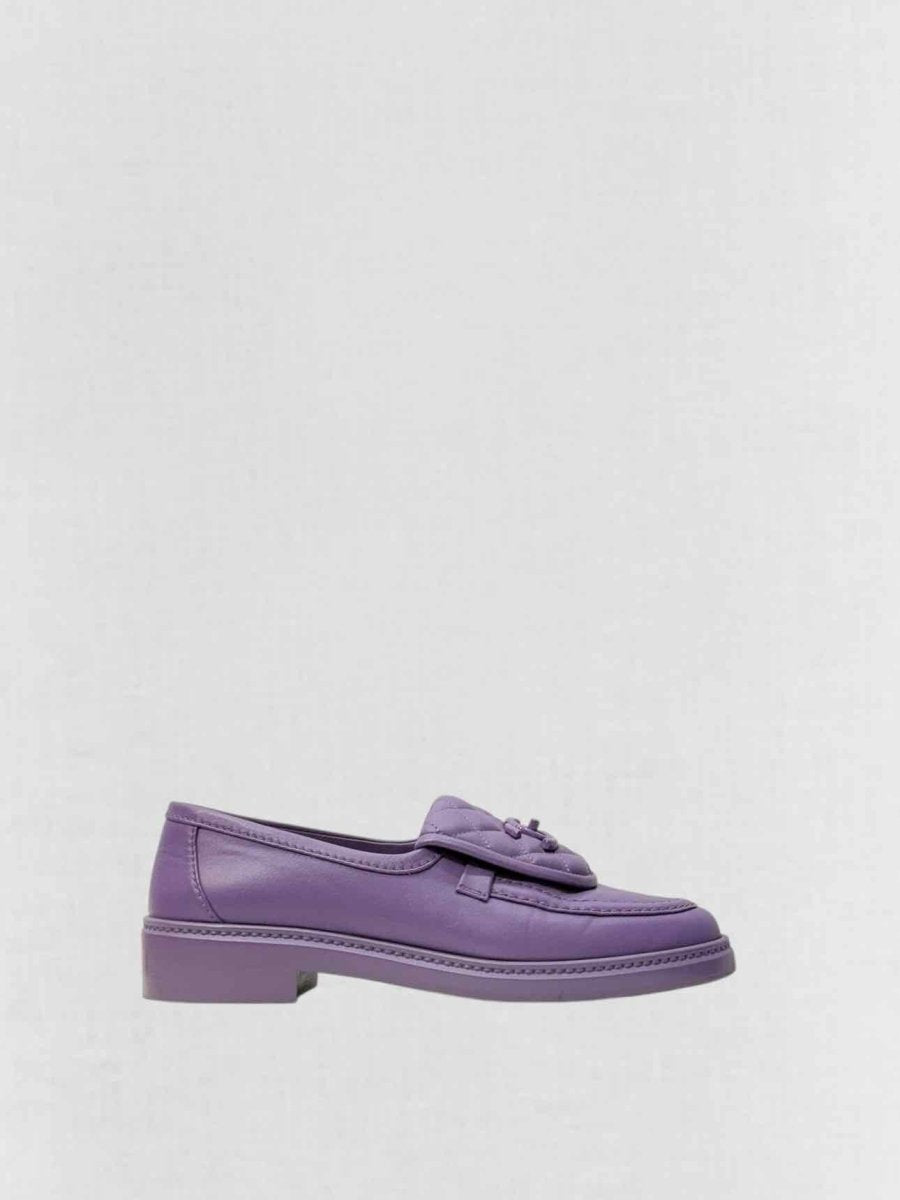 CHANEL Purple Quilted Size EU 37.5 Loafers