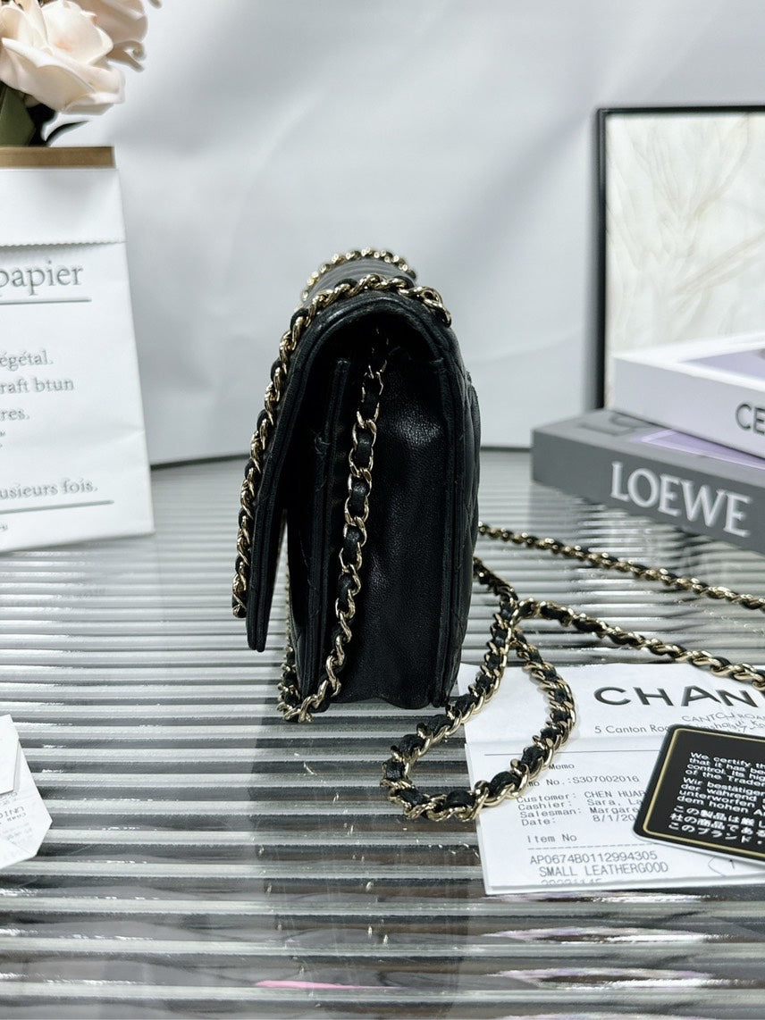 Chanel  WOC Black Quilted Leather Crossbody Bag